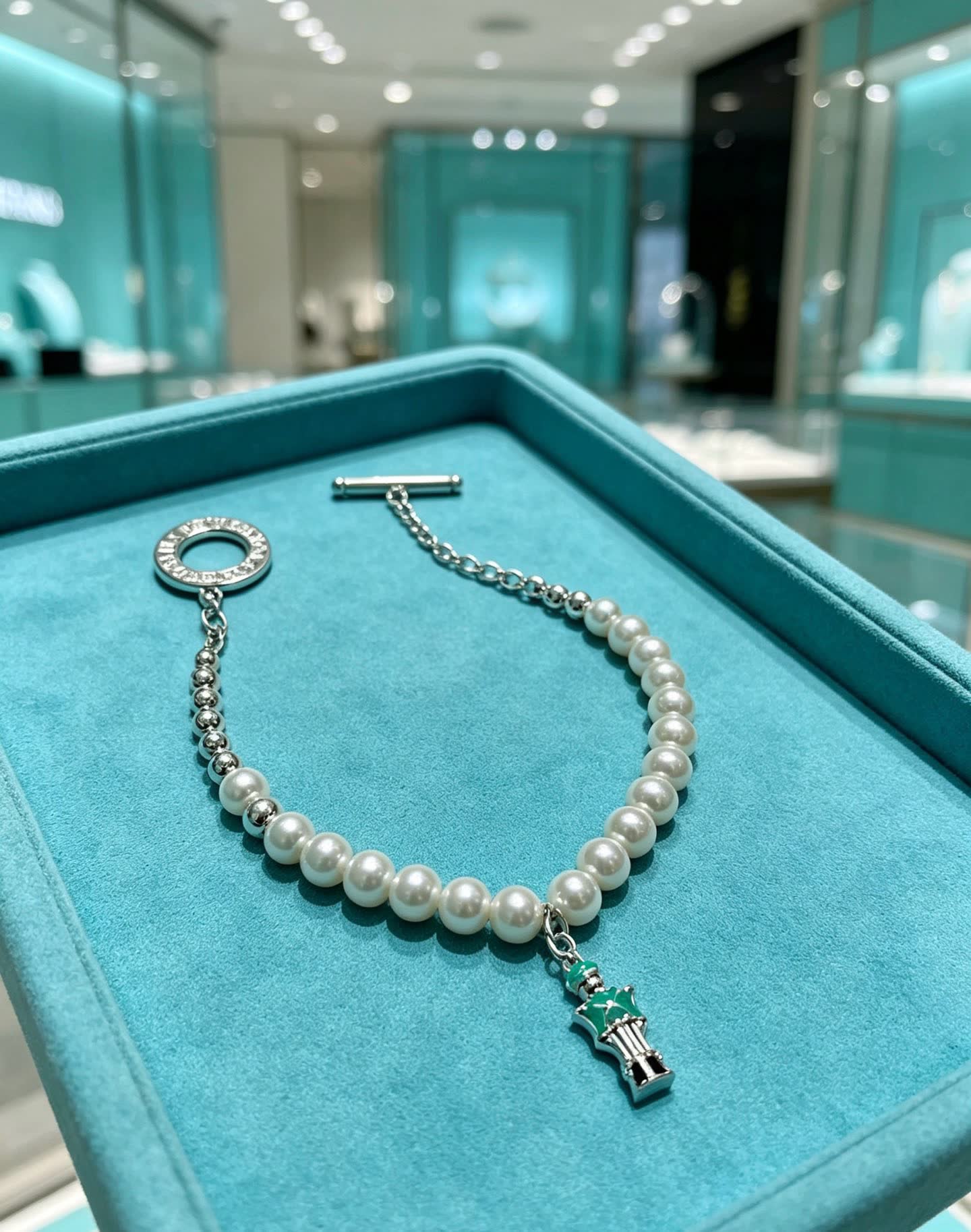Tiffany & Co. Pearl and Bead Bracelet with Green Enamel Charm